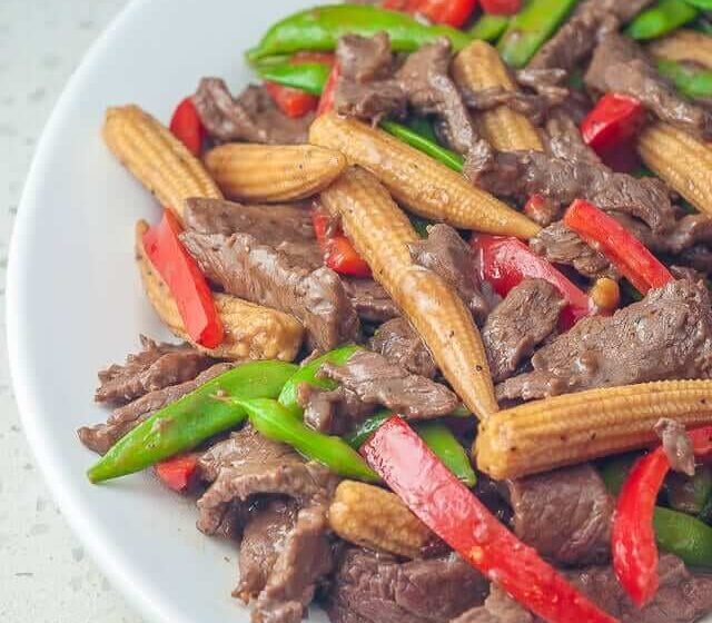 Beed Stir fry with baby corn snow peas and carrots